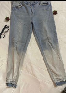 Distressed Light Wash Denim Jeans