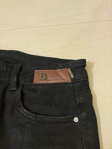 Black Flared Jeans with Slits