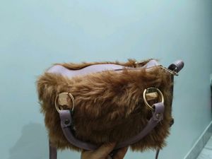 brown fur sling bag