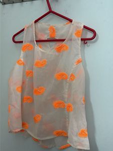 Orange Sheer Tank Top and striped strap to