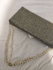 Woven Clutch with Flower Accent