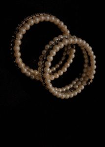 Elegant Pearl and Crystal Coil Bracelets