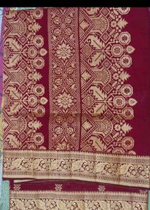 Elegant Maroon and Gold Saree