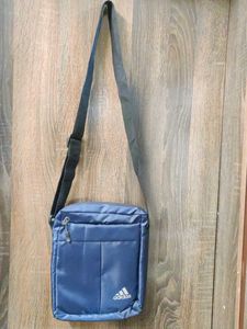 stylish Adidas crossbody/sling bag in navy blue. L