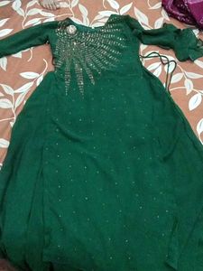 green colour long gown ....  mirror work