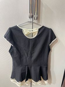 Chic Black Dress with Bow Detail