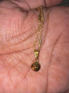 Elegant Gold Necklace with Crystal Pendant
