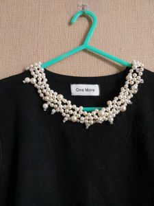 Elegant Black Top with Pearl Detail