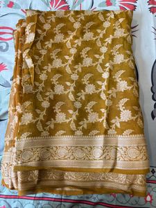 Elegant Brown Saree with Intricate Motifs