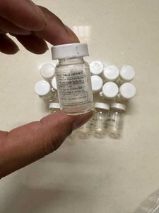 Lot of 17 Small Glass Bottles with Caps