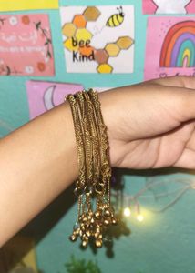 Gold Tone Bangles with Charm Drops 🪭