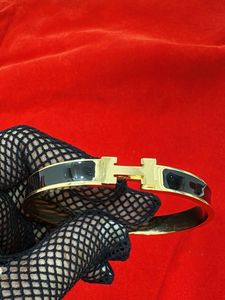 Gold &amp; Black H Bangle Bracelet