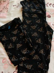 Cozy Black Pyjama Set with Retro Space Print