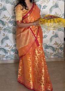 Elegant Orange Saree with Gold Motifs