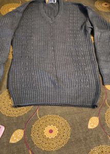 Gray V-Neck Knit Sweater and curtain