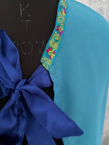 Turquoise top with Embroidered Neckline