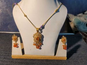 Orenge Locket With Ear Rings