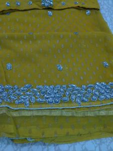 Yellow saree with Silver Embellishments