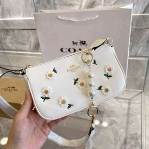Coach nolita with box packing rakhi sale