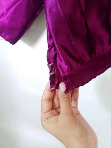 Elegant Purple Saree with Gold Embellishments