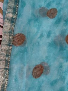 Stunning Teal Blue Saree with Gold Accents