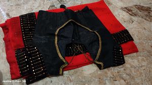 Elegant Red Saree with Black Embellished Border
