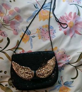 Sparkly Black Clutch with Gold Bow
