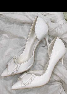 Elegant White D'Orsay Heels with Bow Detail