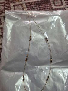 Elegant Gold Necklace with Emerald Pendant