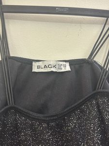 Black glitter and shimmer banana top
