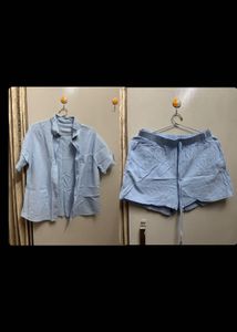 Light Blue Button-Down Shirt with shorts