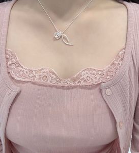 Silver Bow Pendant Necklace