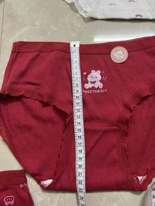 Pink cargo jeans and 5 briefs