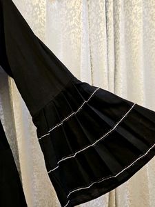 elegant black umbrella abaya with white tiers