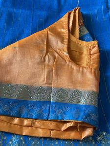 Elegant Orange Saree with Blue Border