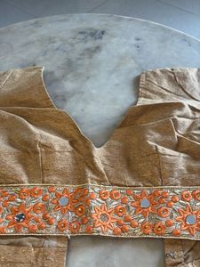 Elegant Orange Saree with Intricate Border