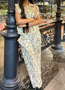 women beige botanical print co-ord set .