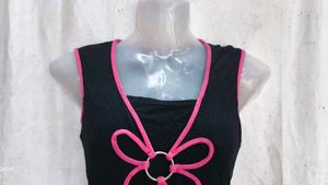 Black Sleeveless Top with Pink Flower Design