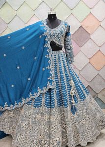 Exquisite Teal Embellished Lehenga Choli