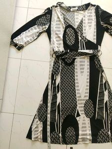 offer!! Branded Black and White One-piece