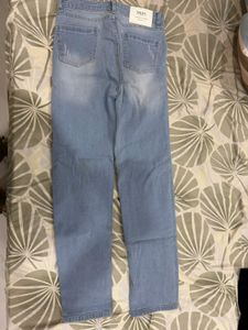 Light Wash Distressed Denim Jeans