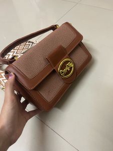 Chic Brown Crossbody Bag with Patterned Strap