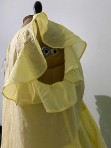 Yellow Ruffle Mango Top