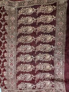 Elegant Maroon Silk Saree with Golden Floral Desig