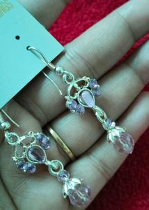 Brand new Elegant Drop Earrings with Purple Stones