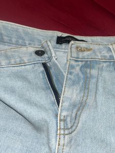 Light Wash Ripped Denim Skirt
