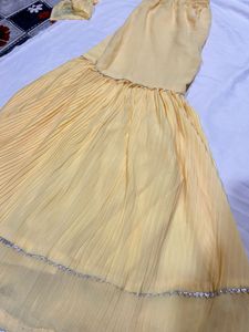 Elegant Yellow Ethnic Gown with cape and padded