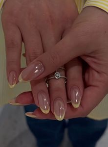 French Tip Oval Nails with Yellow Accent