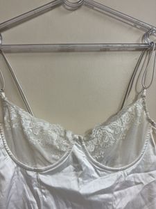 Elegant White Satin Bodysuit with Lace