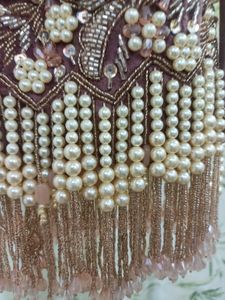 Embroidered clutch
